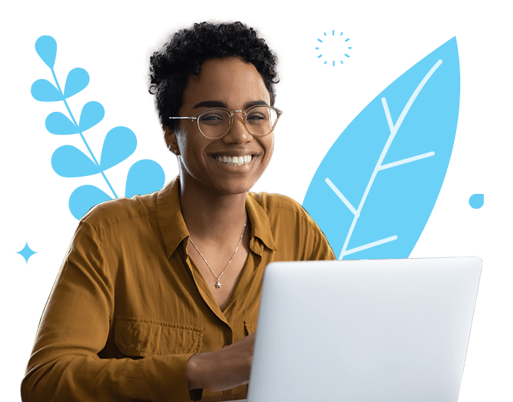 Woman on laptop with leaf background